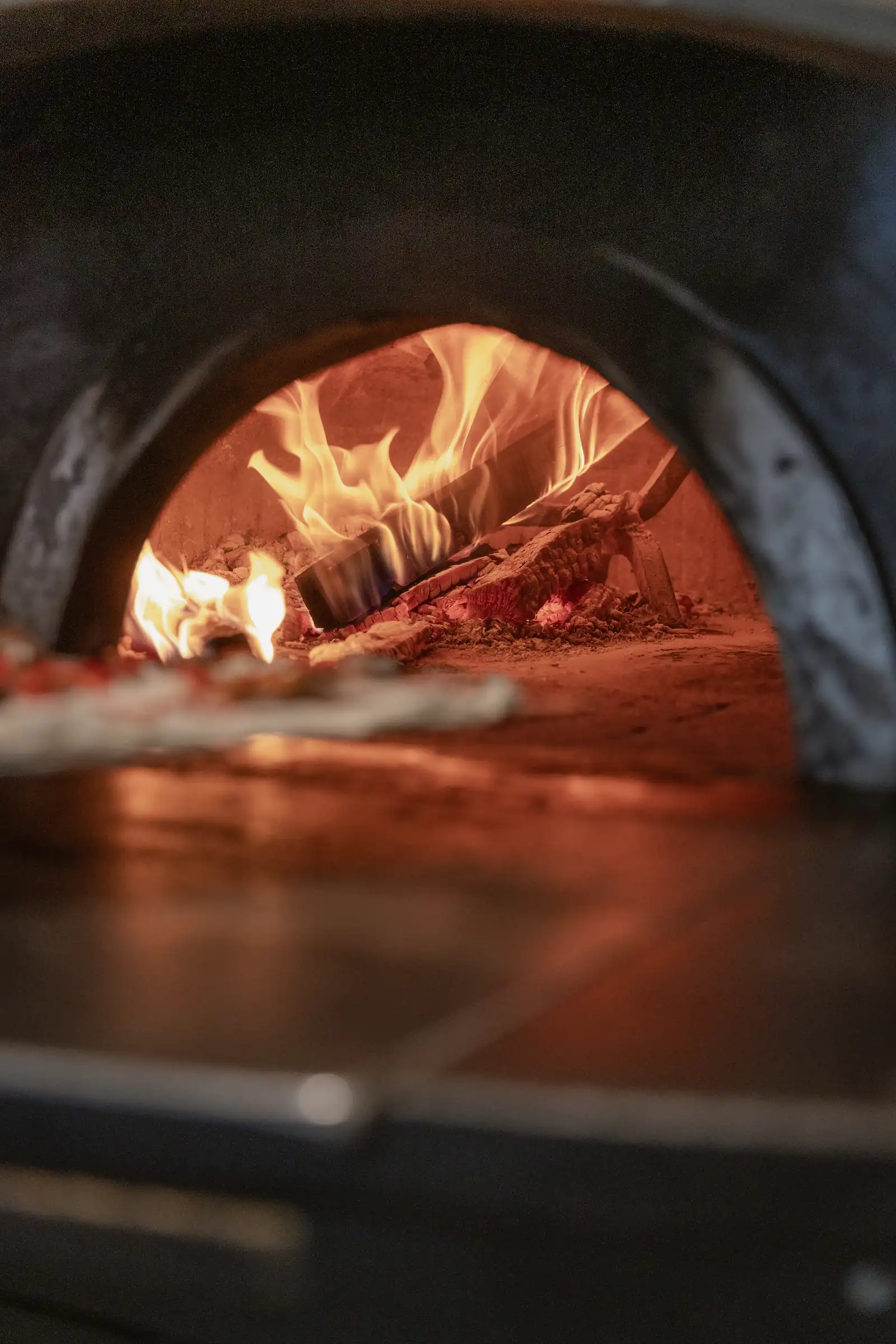 Photo of a wood-fired pizza oven.